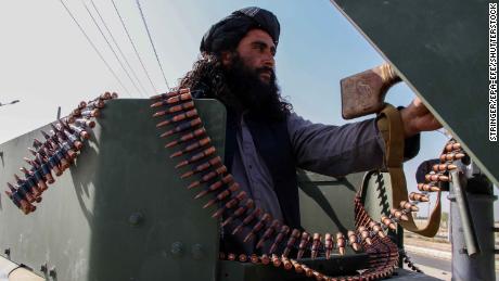 Taliban militants seize US weapons via Kandahar.