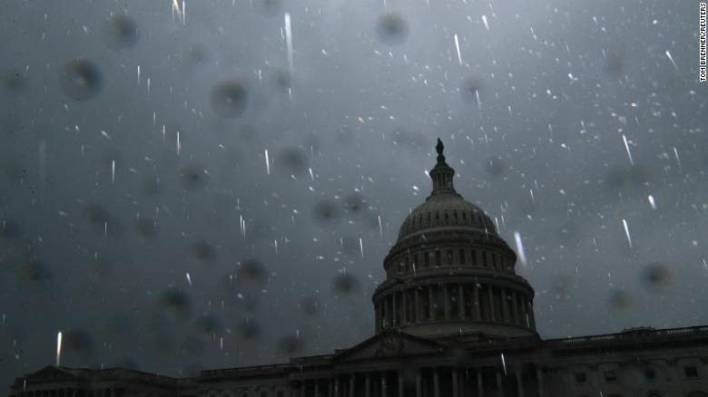 Raindrops are illuminated by a camera flash near the US Capitol as Ida's remnants pass over Washington, DC, on September 1.