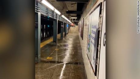 Torrent of water pours into New York subway station