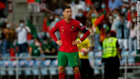 Portugal&#39;s forward Cristiano Ronaldo reacts after the FIFA World Cup Qatar 2022 European qualifying round group A football match between Portugal and Republic of Ireland at the Algarve stadium in Loule, near Faro, southern Portugal, on September 1, 2021. 