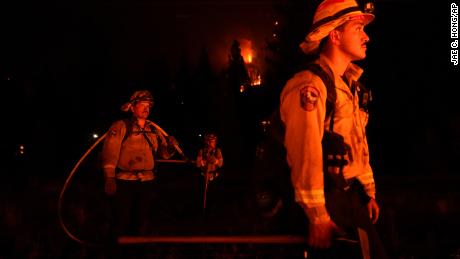 Firefighters battle wildfires, fatigue and Covid-19 as California braces for an extended fire season