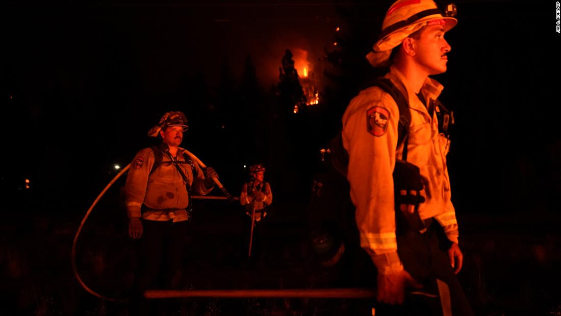 Firefighters battle wildfires, fatigue and Covid-19 as California braces for an extended fire season