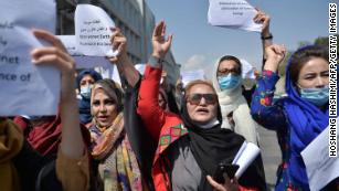 Afghan women take part in a protest march for their rights under the Taliban rule in the downtown area of Kabul on Friday.