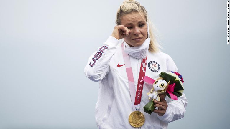 A tearful Masters receives her time trial gold medal at the Tokyo Paralympics. 