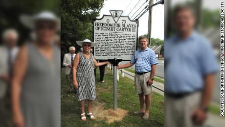The Northern Neck of Virginia Historical Society has been honoring those manumitted by Carter since 2008. A highlight of the 2016 ceremony was the unveiling of a highway marker, which the society secured funding for. Here, Regina Baylor, a descendant of nine WIlson family members who Carter freed, and Carter descendant Charles Belfield pose with the sign. 