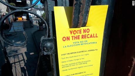 Groups opposed to the recall have been going door-to-door in neighborhoods to encourage Latino voters to return their ballots. 