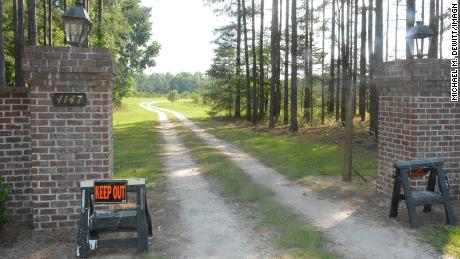 &quot;Keep Out&quot; signs mark an entrance to the Murdaugh family property in Islandton, where authorities say Alex Murdaugh&#39;s wife and son were killed in June. 