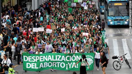 Activists supporting the decriminalization of abortion in Mexico march in Guadalajara, Mexico, on September 28, 2019.