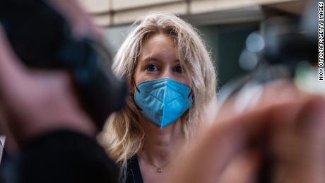 Elizabeth Holmes, the founder and former CEO of blood testing and life sciences company Theranos, arrives for the first day of jury selection in her fraud trial, outside Federal Court in San Jose, California on August 31, 2021. 