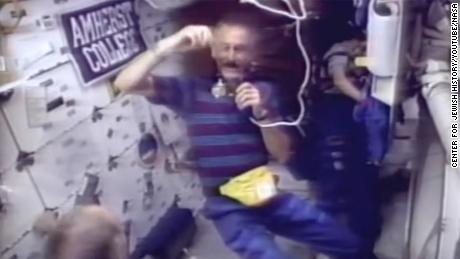 Jeffrey Hoffman, NASA&#39;s first Jewish male astronaut, seen spinning a dreidel during a shuttle mission in 1993.