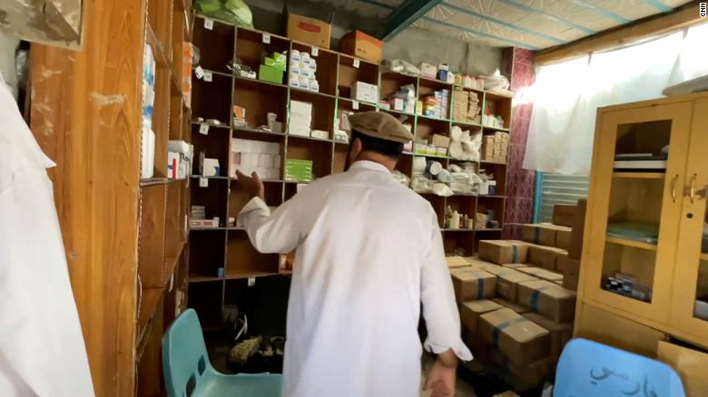 Khan displays the hospital&#39;s stock room, as concern grows over access to healthcare in the country.