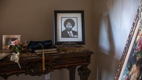 A charcoal portrait of Balbir Singh Sodhi made by a student who heard his story from his brother Rana Sodhi is displayed in Rana Sodhi&#39;s home in Mesa, Arizona, on September 5, 2021.