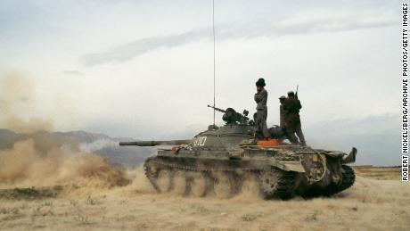 Taliban militants battle the Northern Alliance  in Charikar, Afghanistan in October 1996, a month after seizing Kabul.