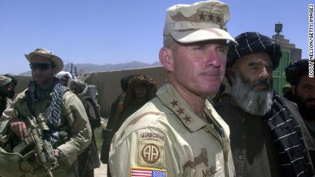 US Army General Dan McNeill, the commander of coalition forces in Afghanistan, speak to reporters in July 2002. McNeill had just met with local elders in the village of Deh Rawud in southern Afghanistan. 