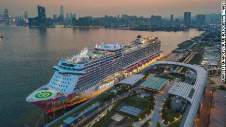 The Genting Dream cruise ship is moored at the Kai Tak Cruise terminal in this panorama by drone in Hong Kong, China, 23 Jul 2021. Hong Kong is about to allow fully vaccinated &#39;&#39;cruises to nowhere&#39;&#39; starting in August. (Photo by Marc Fernandes/NurPhoto via Getty Images)