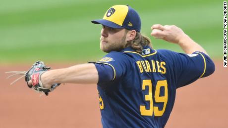 Milwaukee Brewers starting pitcher Corbin Burnes delivers a pitch in the first inning against the Cleveland Indians at Progressive Field on Saturday.