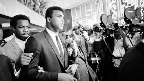 Ali tells the assembled media &quot;no comment&quot; during a recess in his trial for dodging the US military draft in 1967.