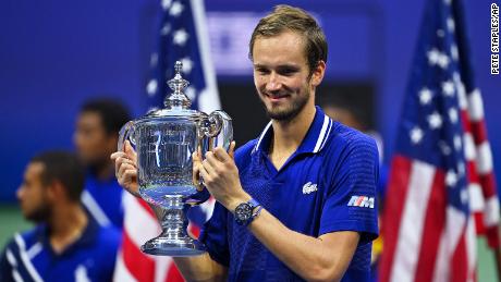 Medvedev celebrates with the US Open trophy - his first major title. 