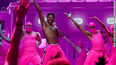 Lil Nas X (center) performs onstage during the 2021 MTV Video Music Awards at the Barclays Center in Brooklyn, New York on September 12. 