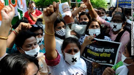 Protesters gather in Delhi to condemn the rape and murder of a 9-year-old girl last month. 