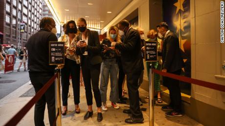 Guests have their vaccine cards and identification checked before entering the theatre at the opening night of previews for &quot;Pass Over&quot; at the August Wilson Theatre in Manhattan on August 4.