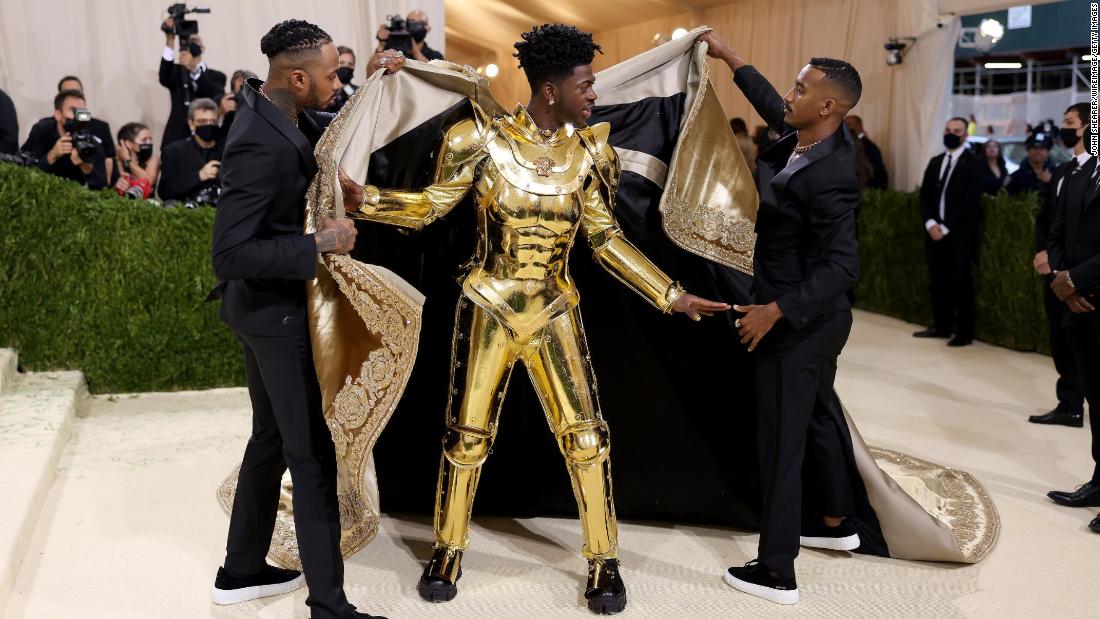The &quot;Old Town Road&quot; singer then whipped off his cloak to reveal a suit of golden armor.
