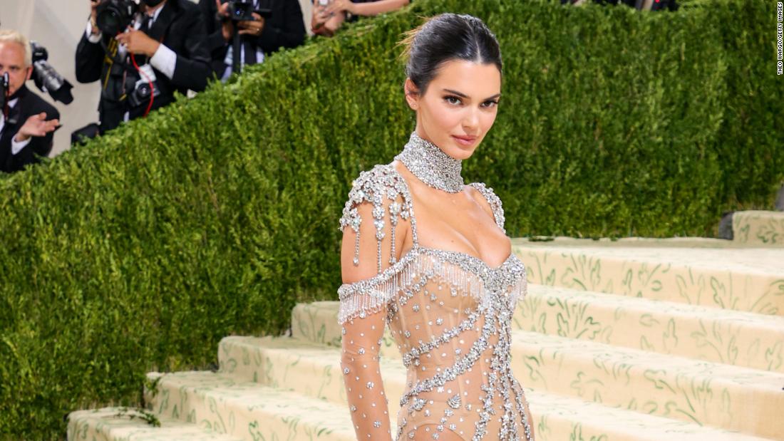 Kendall Jenner dazzled in a barely-there glittering Givenchy gown with a high crystal choker and shoulder details. She said on Instagram that the dress was inspired by Audrey Hepburn and was a reference to &quot;My Fair Lady.&quot;