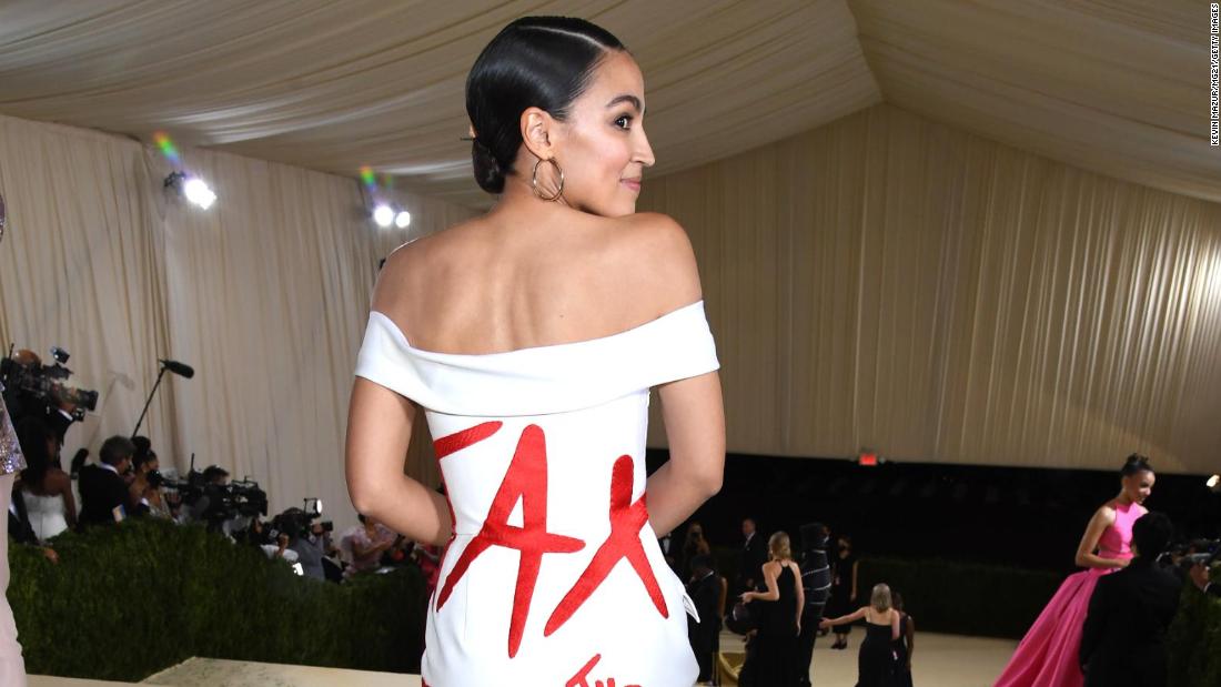 New York Congresswoman Alexandria Ocasio-Cortez made the statement &quot;Tax the Rich&quot; through a white tulle-hemmed mermaid gown by Brooklyn-based designer Brother Vellies.