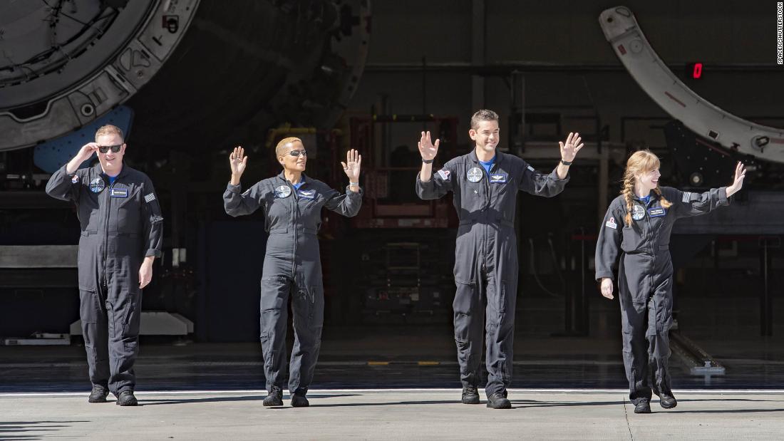 From left, Sembroski, Proctor, Isaacman and Arceneaux wave before suiting up to board the spacecraft.
