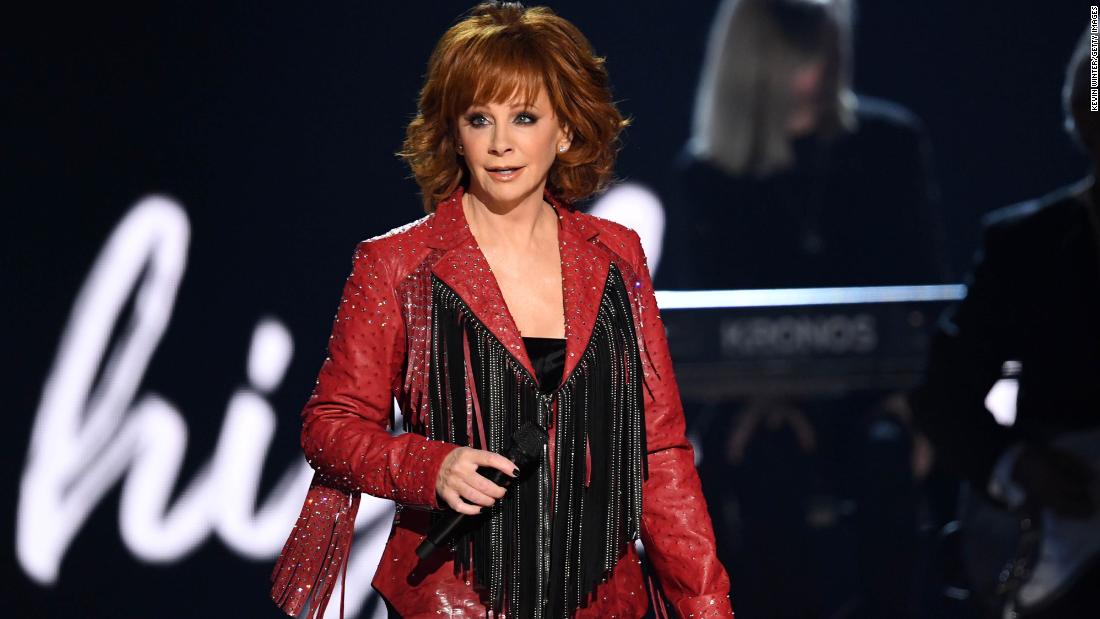 Country star Reba McEntire has to be rescued from a second-story window after stairs collapse in historic Oklahoma building