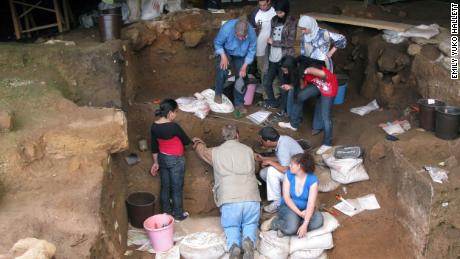 Archaeologists excavate Contrebandiers Cave, Morocco, in 2009.