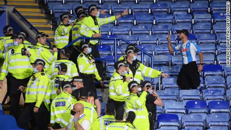 The police had to separate the two groups of supporters inside the stadium.  
