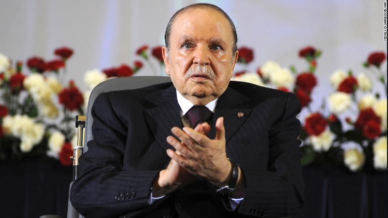 Abdelaziz Bouteflika applauds after taking the oath as President in Algiers in 2014. He died at age 84, state television announced on September 17.