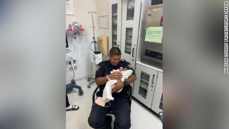 Jersey City Officer Eduardo Matute caught a 1-month-old baby dropped from a 2nd floor balcony on Saturday, authorities said.