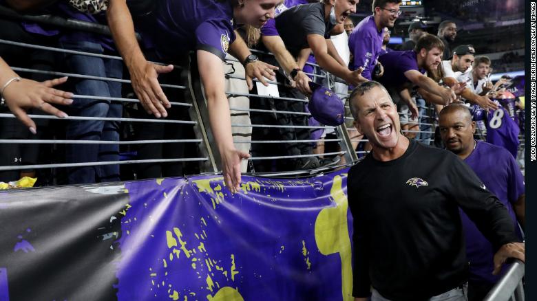 Harbaugh celebrates after defeating the Kansas City Chiefs.