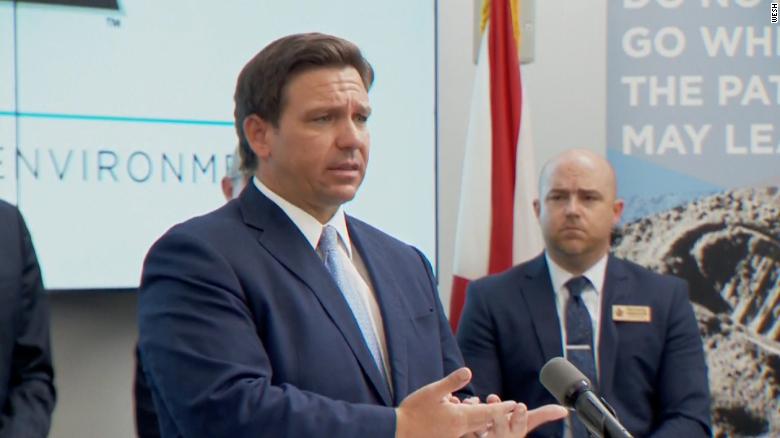 Florida governor says parents can send asymptomatic kids exposed to Covid-19 back to school