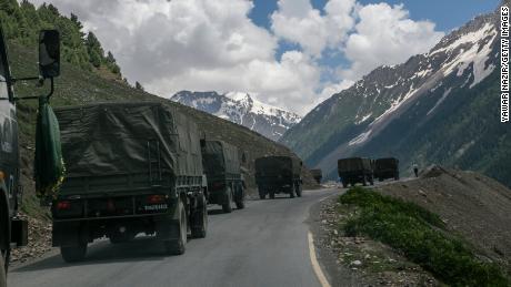 An Indian army convoy carrying reinforcements and supplies travels towards Leh through Zoji La, a high mountain pass bordering China on June 13 in Ladakh, India.
