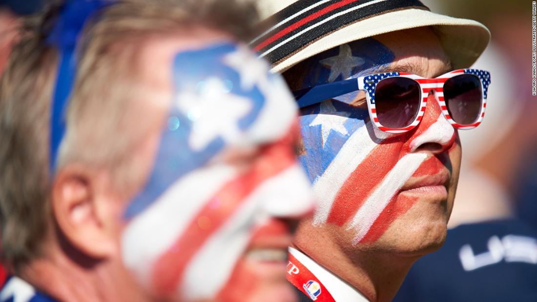 Team USA fans with faces painted in red, white, blue, stars and stripes at Hazeltine National in 2016.