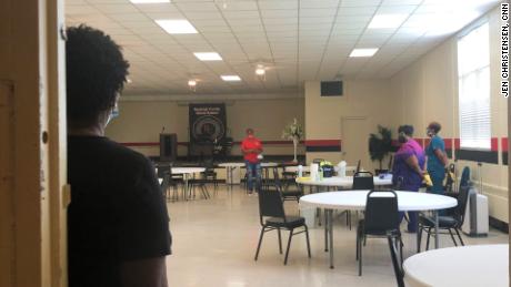 Volunteers wait for teens to show at their Vax to School event in Cuthbert, Georgia, this month.