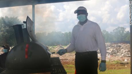 The school district&#39;s bus director volunteered to make burgers for kids who got vaccinated.