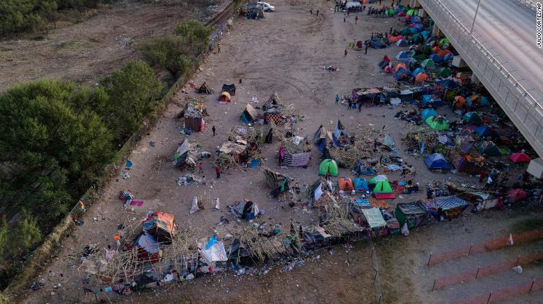 Tens of thousands of migrants held in squalor under Texas bridge - CNN