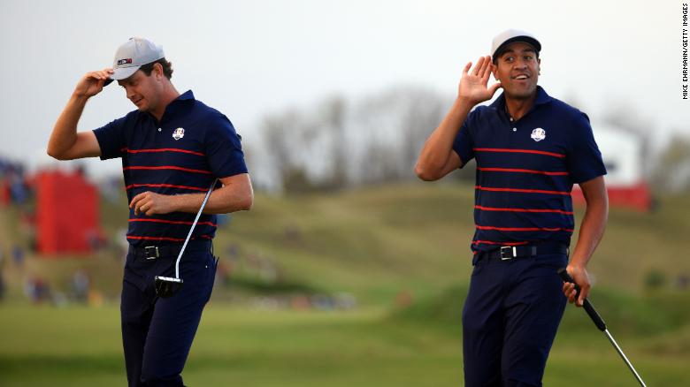 Harris English (left) and Tony Finau celebrate on the 15th green after winning their Fourball match.