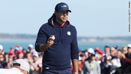 Koepka celebrates on the 15th green during Saturday morning Foursome Matches.