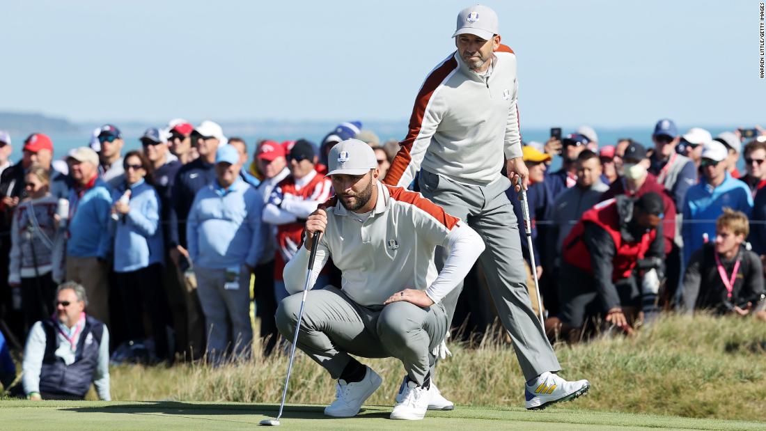 Team Europe&#39;s Jon Rahm (left) and Sergio Garcia line up a putt on the 15th green during Saturday morning Foursome matches on September 25. &lt;a href=&quot;https://www.cnn.com/2021/09/25/golf/sergio-garcia-ryder-cup-history-spt-intl/index.html&quot; target=&quot;_blank&quot;&gt;Garcia made Ryder Cup history&lt;/a&gt; by becoming the player with the most matches won in the tournament&#39;s history, after their victory over Brooks Koepka and Daniel Berger of Team US.