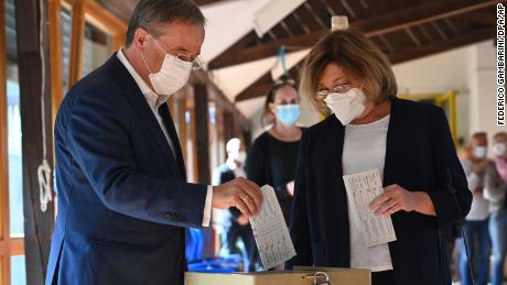 CDU leader Armin Laschet and his wife Susanne vote at a polling station in the city of Aachen on Sunday.