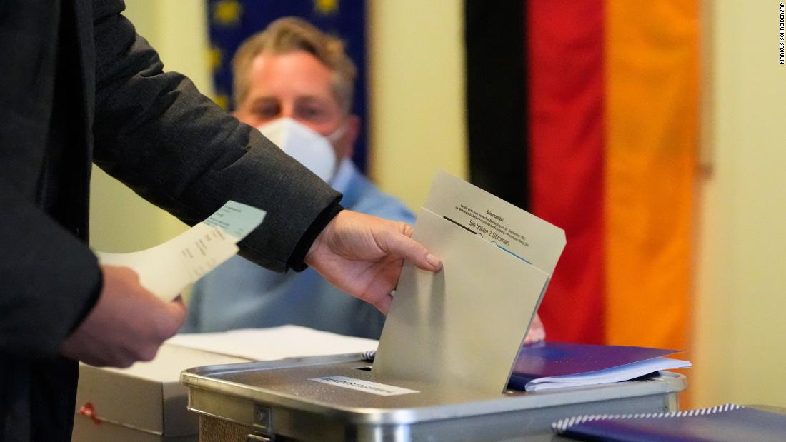 SPD narrowly ahead in exit polls as voting ends in Germany's landmark election but final result uncertain