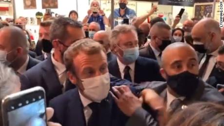 French President Emmanuel Macron hit by egg thrown from crowd in Lyon