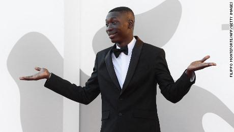 Senegalese-born TikToker Khaby Lame arrives for the screening of the film &quot;Illusions Perdues&quot; (Lost Illusions) presented in competition on September 5, 2021 during the 78th Venice Film Festival at Venice Lido. (Photo by Filippo MONTEFORTE / AFP) (Photo by FILIPPO MONTEFORTE/AFP via Getty Images)