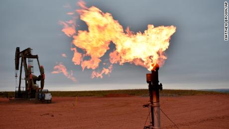 A flare burns natural gas at an oil well Aug. 26, 2021, in Watford City, N.D., part of McKenzie County, the fastest-growing county in the U.S. That&#39;s according to new figures from the Census Bureau. (AP Photo/Matthew Brown)