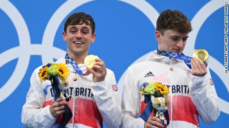 Daley and Lee get their hands on their first Olympic gold medals. 